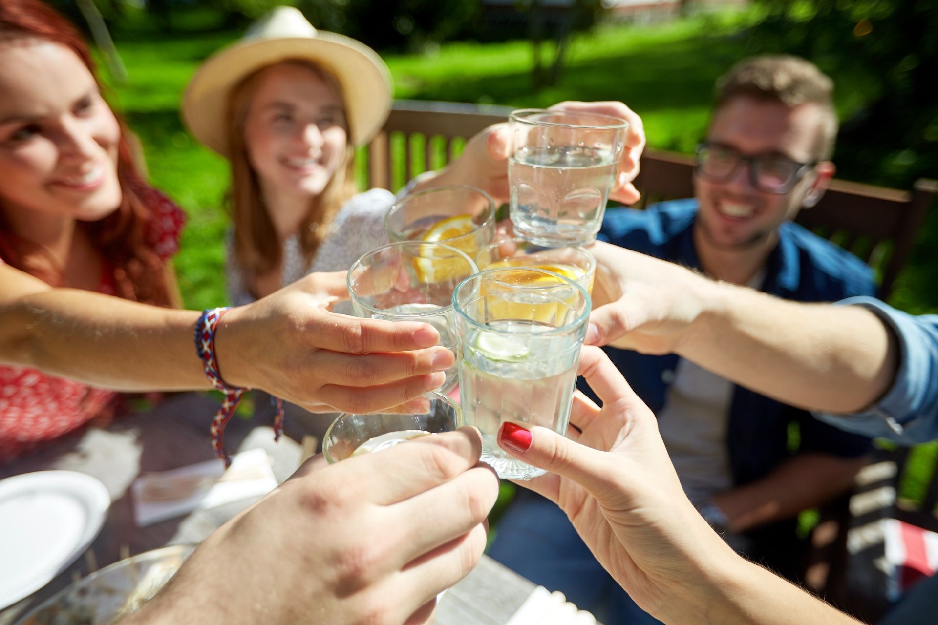 happy-friends-with-drinks-at-summer-garden-party-2026-01-05-04-45-07-utc.jpg